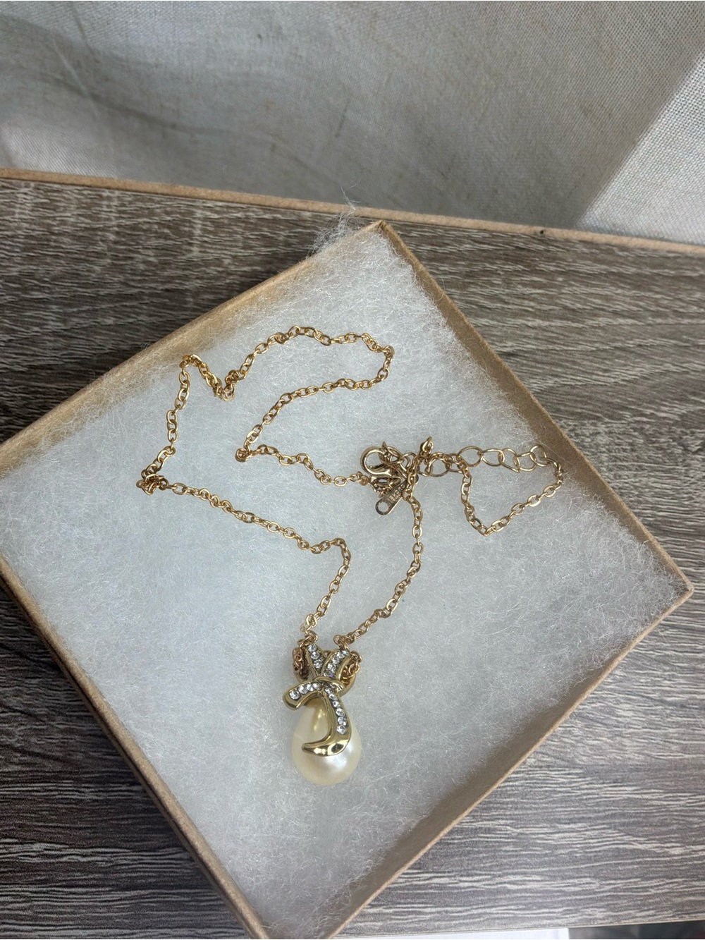 Gold tone Pearl Pendant Necklace with Crystal Bow